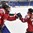 PLYMOUTH, MICHIGAN - APRIL 4: Switzerland's Evelina Raselli #14 high fives her teammate Livia Altmann #22 after scoring against team Czech Republic during relegation round action at the 2017 IIHF Ice Hockey Women's World Championship. (Photo by Minas Panagiotakis/HHOF-IIHF Images)

